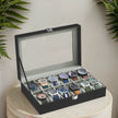 12-Slot Watch Box Organizer – Synthetic Leather – Black with Greenish Grey Lining – Large Glass Lid and Removable Watch Pillows