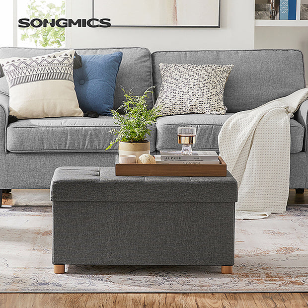Storage Ottoman – Fabric – Dark Grey – Padded, Foldable with Solid Wood Feet and 65L Capacity