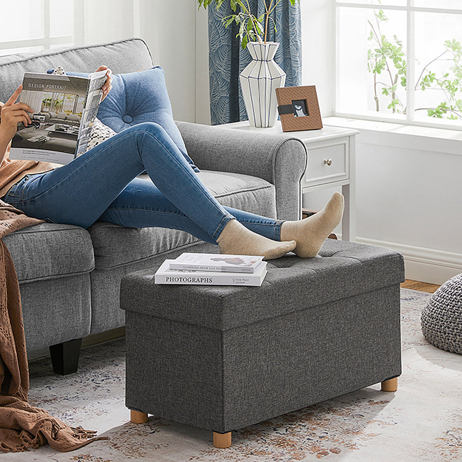 Storage Ottoman – Fabric – Dark Grey – Padded, Foldable with Solid Wood Feet and 65L Capacity