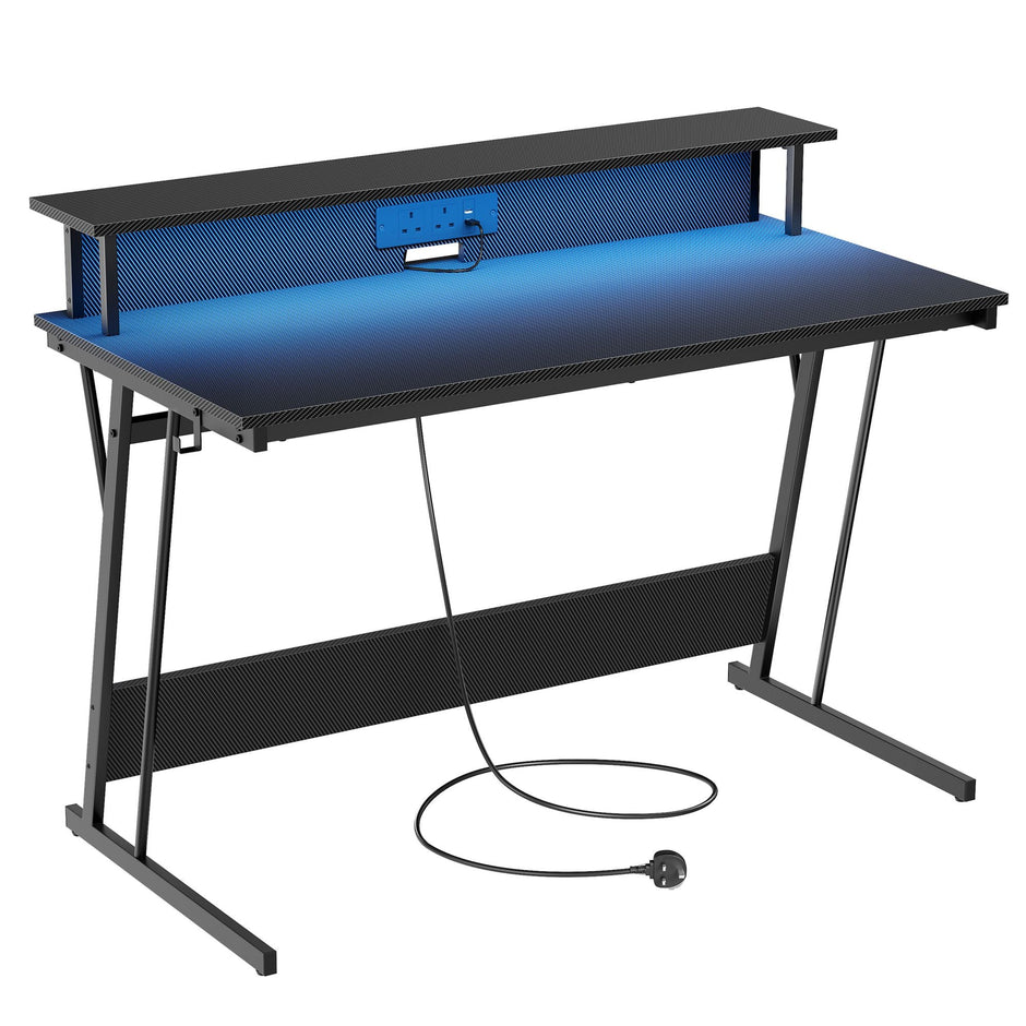 Gaming Desk – Carbon Black – With LED Lights and Built-In Power Outlets, Monitor Shelf for Dual Monitors